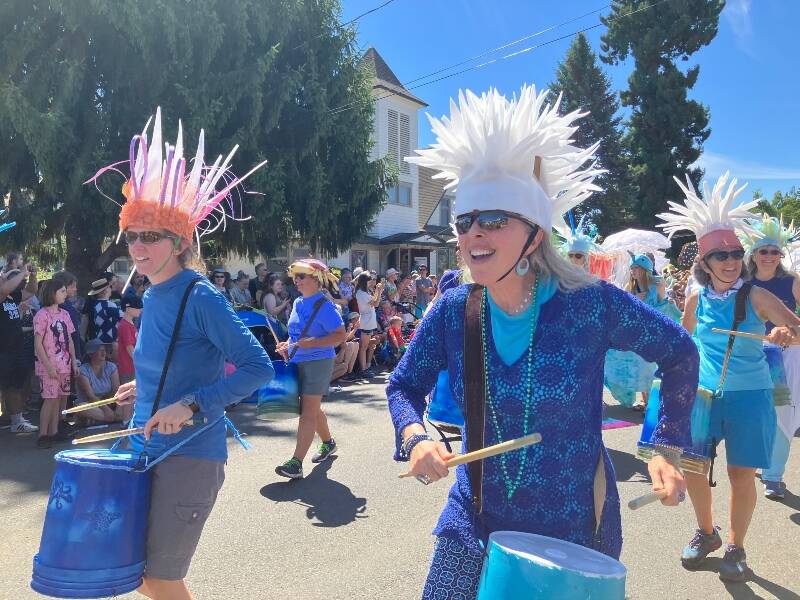 Members of the Vashon Island Marine Band and Procession joyously marched through Vashon in this year’s Strawberry Festival Parade (Tom Hughes Photo).