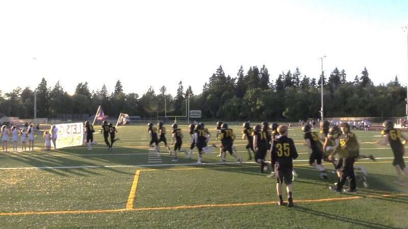 Vashon Pirates take the field at the teams at the home opener game last week (Brent Millett Photo).