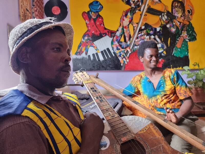 Yosefe Kalekeni, on guitar and bass drum, and Yobu Malingwa, on babatone, make up The Madalitso Band (Courtesy Photo).