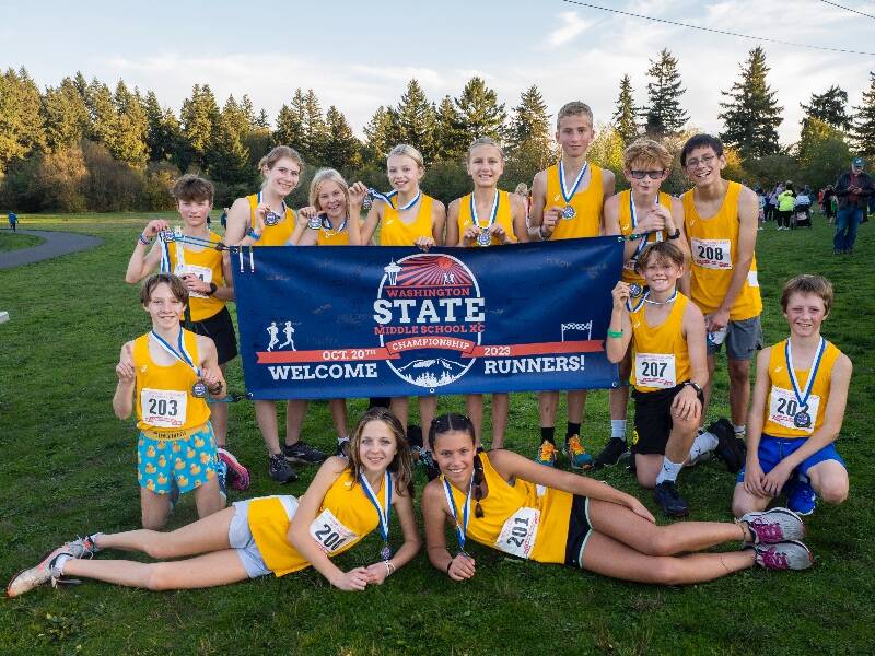 McMurray runners at the Washington State Middle School Cross Country Championships. (Left to right - Front row) Harrison Decker, Katherine Thompson, Lulu Whitfield, Toby Swan, Izzy Dardeau. (Back Row) Chris Healey, Bridget Simmons, Adeline Arthur, Mele Nelson, Annabelle Thompson, Leif McBennett, Max McLachlan, and Mateo Villavicencio (John Decker Photo).