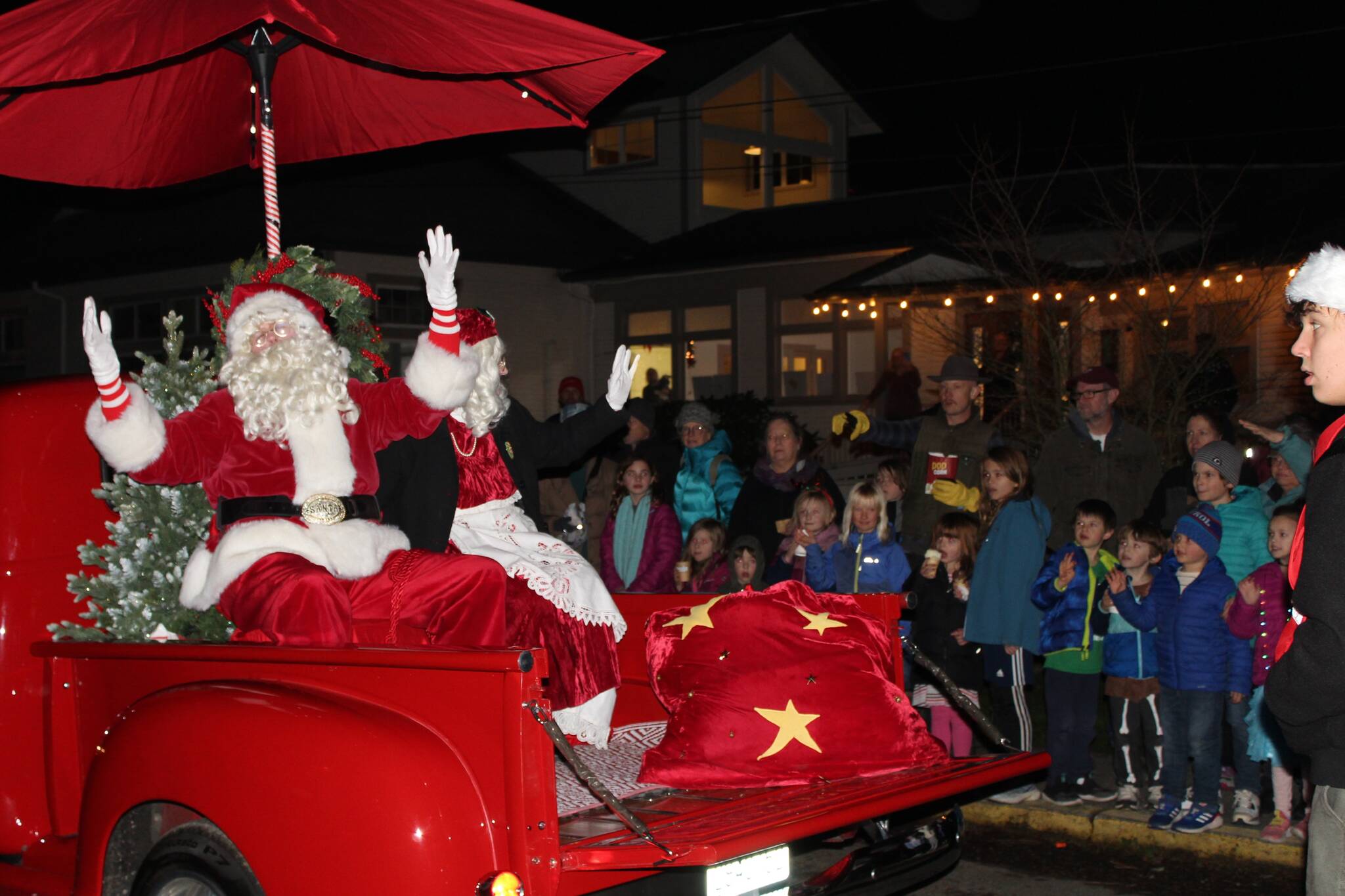 Alex Bruell photo
Santa and Mrs. Claus wave to the crowd at WinterFest.
