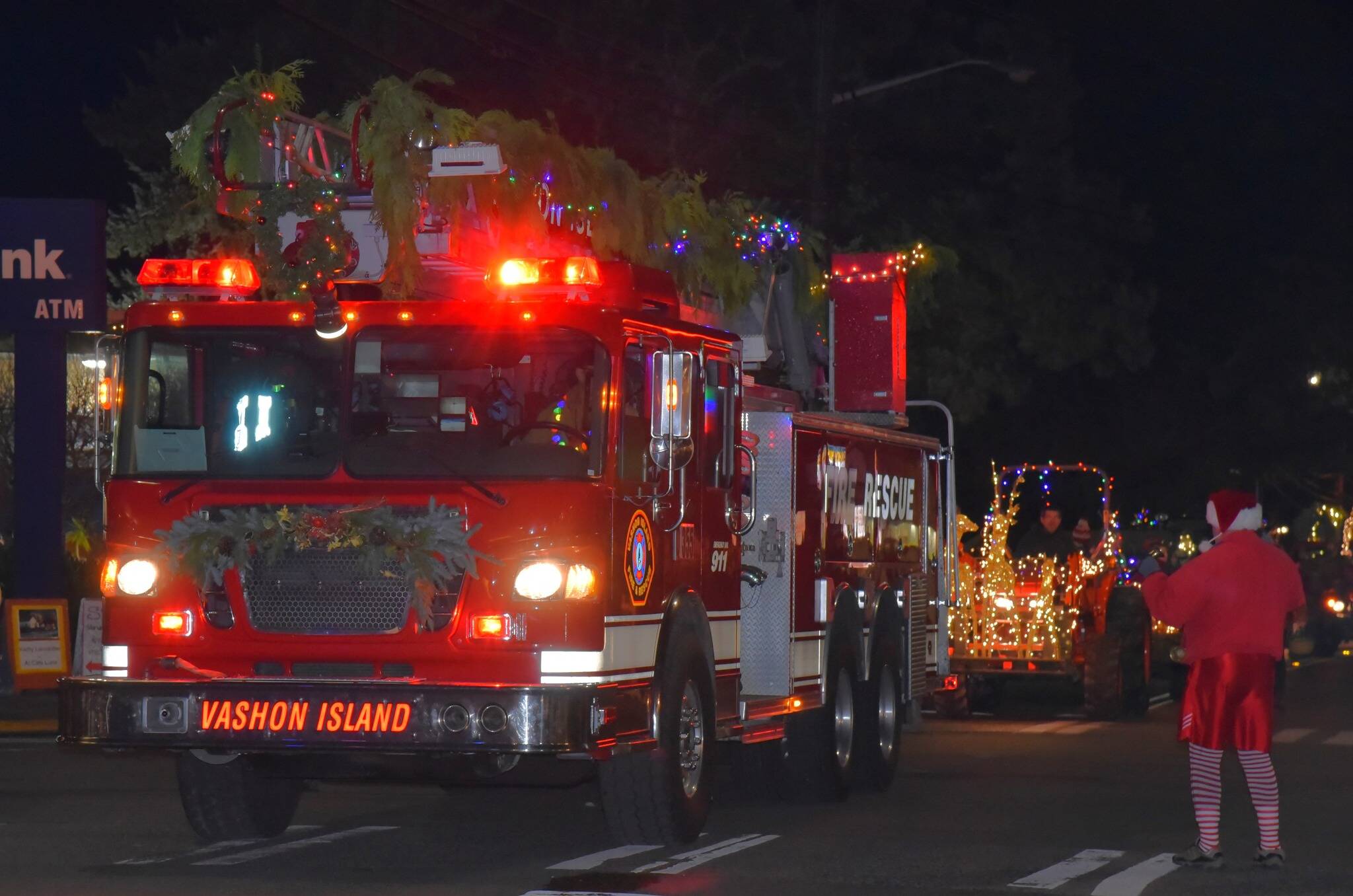 Jim Diers photo
A Vashon Island Fire & Rescue truck leads the parade down Vashon Highway SW.