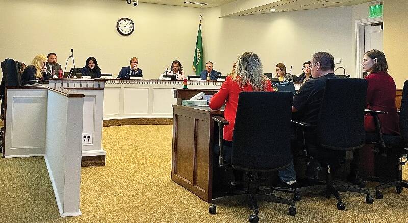 Testifying in favor of HB 1062, a bill to stop deception in interrogations are, from left: Lara Zarowsky, the Executive Director of the Washington Innocence Project; Ted Bradford, the first person in Washington to be exonerated by DNA evidence; and Amanda Knox, a victim of false conviction in Italy (Photo by Aspen Anderson, Washington State Journal).