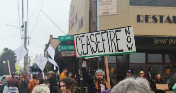 Around one hundred demonstrators took to the town core Sunday afternoon on Vashon Island to call for a ceasefire in Gaza.