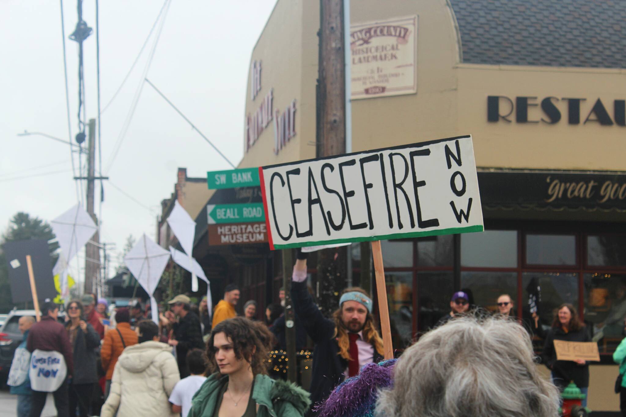 Around one hundred demonstrators took to the town core Sunday afternoon on Vashon Island to call for a ceasefire in Gaza.