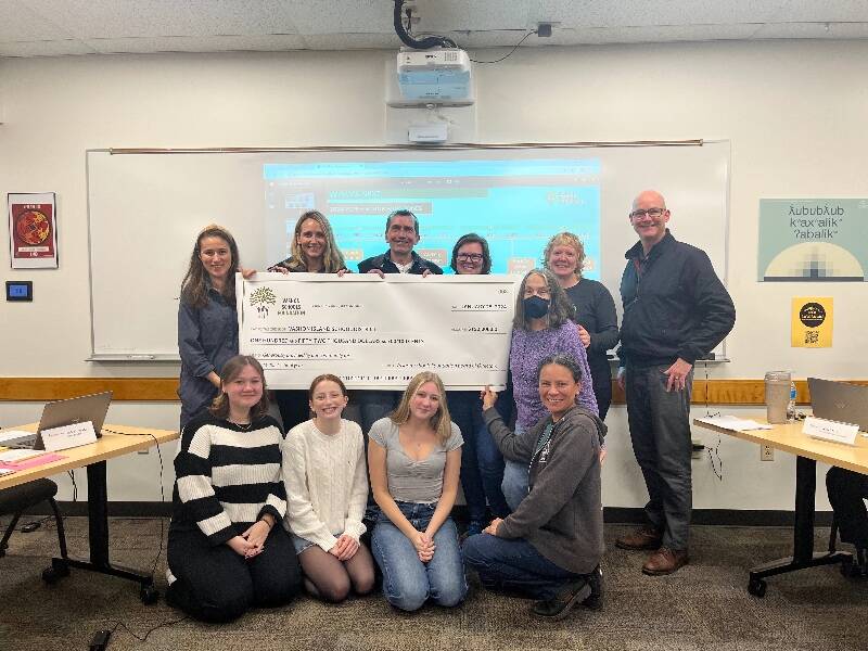 The Vashon Schools Foundation presents the Vashon Island School District board with its annual donation, this year totaling $152,000 (Courtesy Photo).