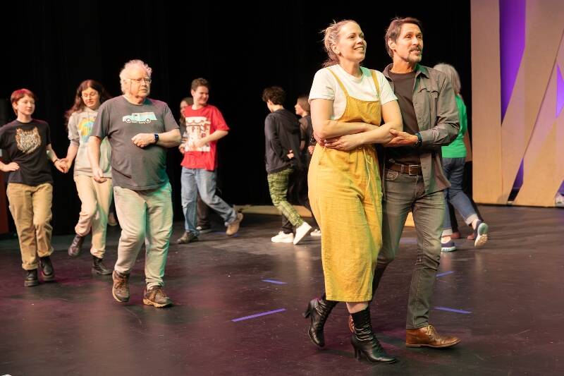 Erika Strandberg as Miss Aimens and Michael Wishkoski as Duke Senior (coupled in front), Mark Wells (behind), and the cast of “As You Like It” (Steven Sterne Photo).