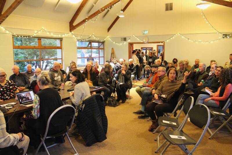 Islanders filled the meeting room at the Vashon-Maury Island Land Trust on March 21 to hear a presentation about the Thunderbird Treatment Center (Photo by Alex Bruell).