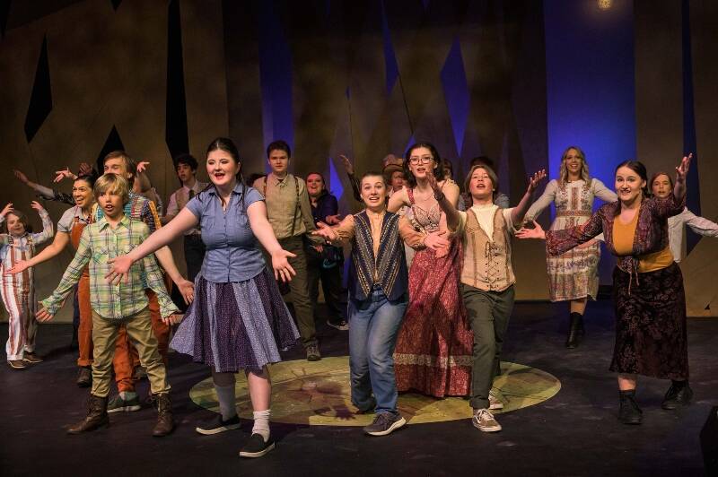 The multigenerational cast of “As You Like It” includes this exuberant group of island youth (Jeff Dunnicliff Photo).