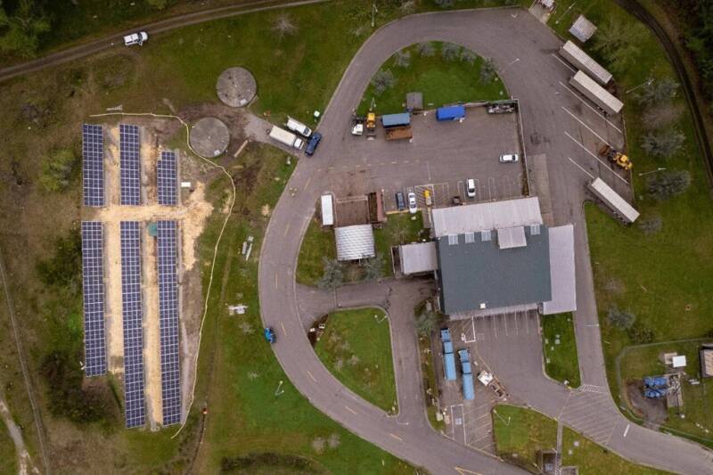 This aerial view shows the Vashon Recycling and Transfer Station with its relatively new solar array, which produces about 172,000 kilowatt hours of electricity annually (Photo courtesy King County).
