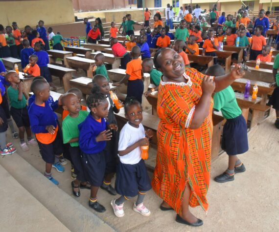 Jim Diers photos 
Vashon Primary School principal Judith Abenawe dances with students.