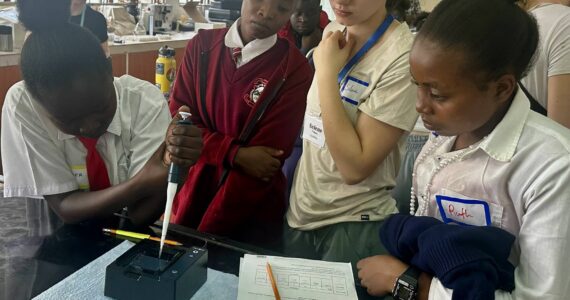 Courtesy photo
Vashon student Selene Dalinis and Kenyan students load gels for DNA analysis in a classroom lab in Kenya.