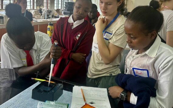 Courtesy photo
Vashon student Selene Dalinis and Kenyan students load gels for DNA analysis in a classroom lab in Kenya.