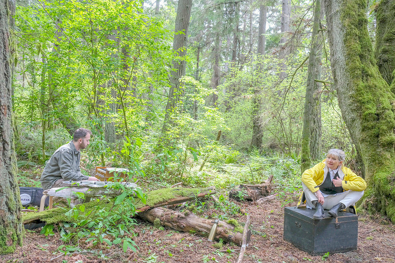 Mik Kulhman first performed her outdoor immersive theater work, “Standing Nation,” with musician Max Sarkowsky, in 2022. She’s now reviving the work on Vashon. (Michelle Bates photo)
