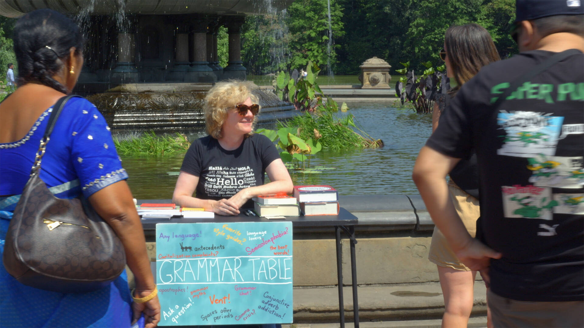 Ellen Jovin welcomes visitors to her roving Grammar Table in “Rebel With a Clause.”