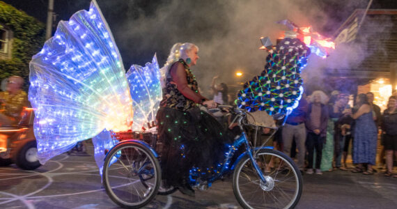 Lynann Politte lights up the night on her tricked-out trike on Stupid Bike Night. (Michelle Bates Photo)