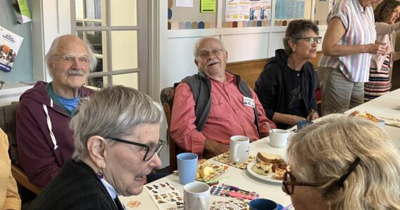 Members and volunteers at the Old Friends Club mixed and mingled at the program’s launch on Sept. 17. (Elizabeth Shepherd Photo)