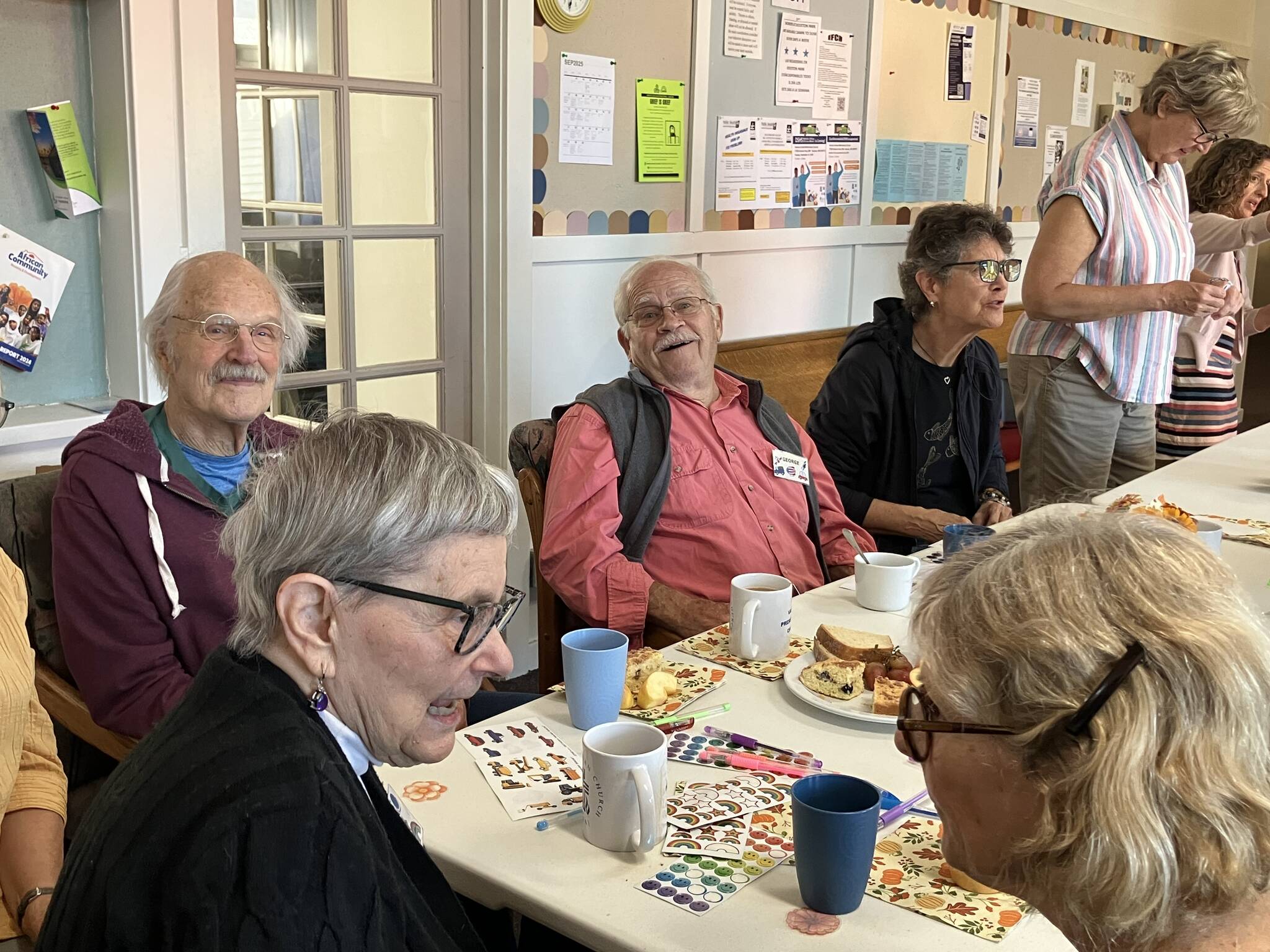 Members and volunteers at the Old Friends Club mixed and mingled at the programs launch on Sept. 17. (Elizabeth Shepherd Photo)