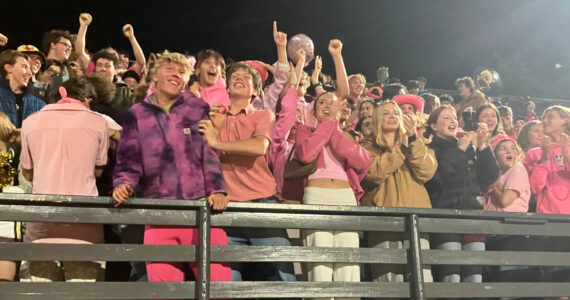 Vashon High School’s student section — known usually as “The Green Tide,” turned pink on homecoming.