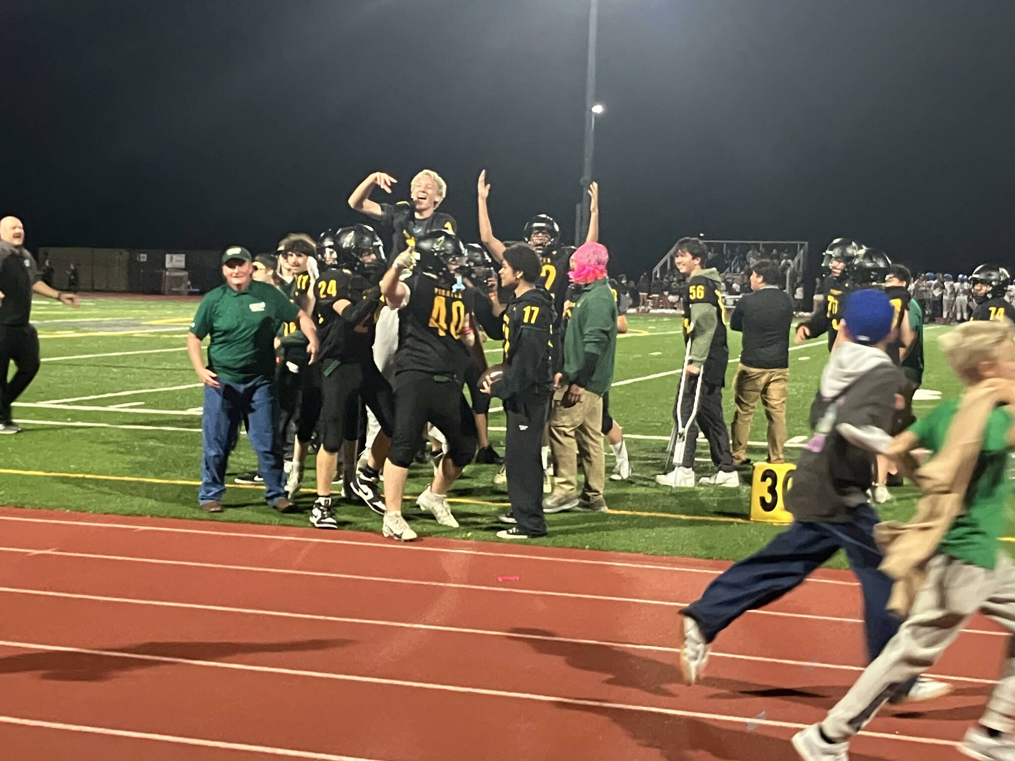 Vashon Pirates celebrate after a touchdown in the 4th quarter. (Elizabeth Shepherd Photo)