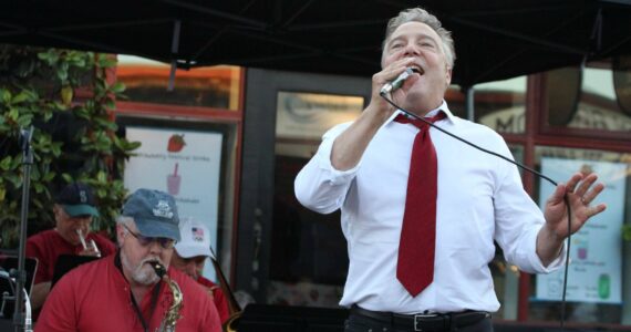Vashon’s answer to Frank Sinatra, Lou Mangione, seen here performing with Portage Fill at Strawberry Festival, will offer a concert, “Lou’s Home Cooking,” on Oct. 25 at Snapdragon’s Black Cat Cabaret. (Alex Bruell Photo)