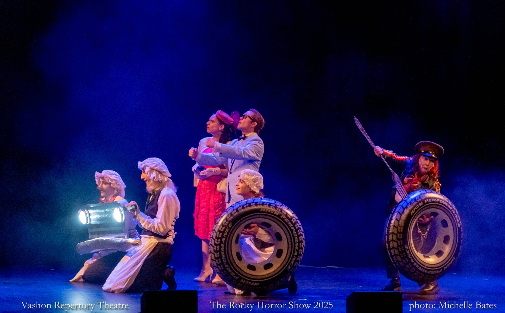 A innocent (but not for long) couple, Brad and Janet, played by Hail Howell Quackenbush and Sierra Tinfof, drive toward their destiny in “The Rocky Horror Show.”(Michelle Bates Photo)