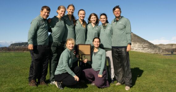 John Decker Photo
The Vashon High School girls cross-country team after winning the district championship.