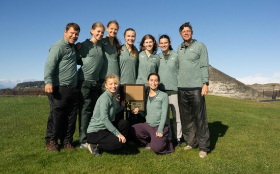 John Decker Photo
The Vashon High School girls cross-country team after winning the district championship.