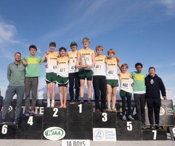 <p>John Decker Photo</p>
                                <p>The Vashon boys cross-country team celebrates its fourth-place podium finish at the state championships in Pasco on Nov. 8.</p>