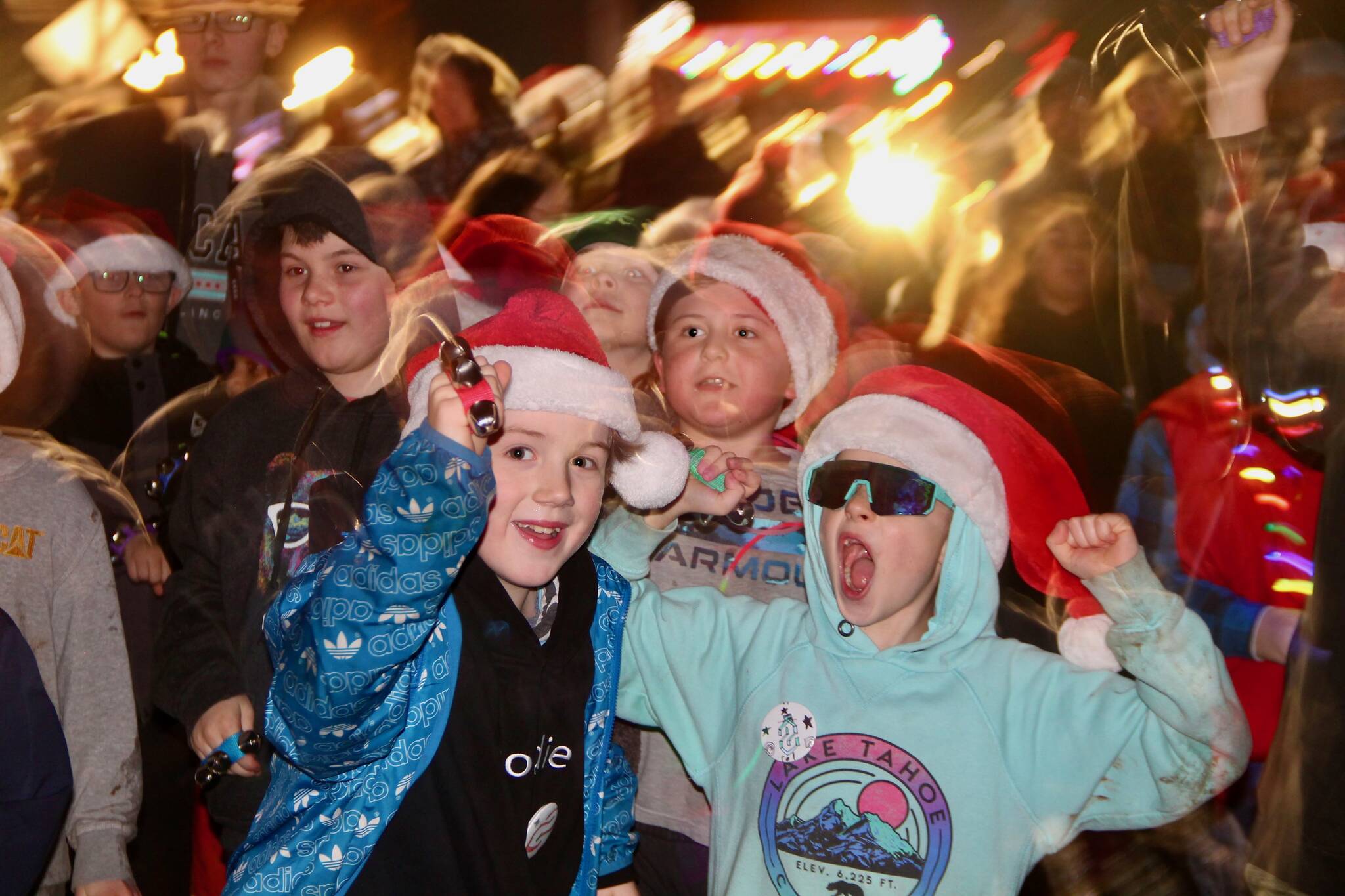 Tom Hughes Photo
Third-graders from Chautauqua Elementary School led the parade, singing and ringing jingle bells as they went. (Tom Hughes Photo)