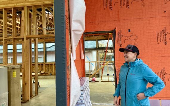 Emily Scott at the construction site of the new Vashon Food Bank. (Aspen Anderson Photo)