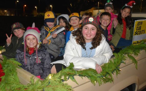 Jim Diers Photos
Smiles from Cub Scouts helped light up the night at WinterFest