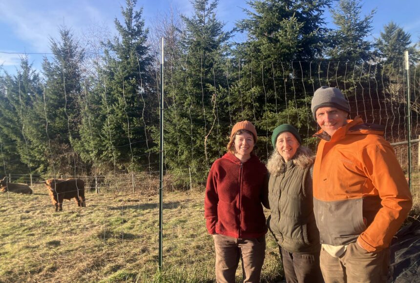 <p>Leslie Brown Photo</p>
                                <p>Olivia Mancl (left) stands with Joanne Jewell and Rob Peterson at Plum Forest Farm on Vashon.</p>