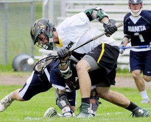 Winter Krimmert faces off in the team’s final game against Juanita. Krimmert was among the four Vultures who received all-conference honors.