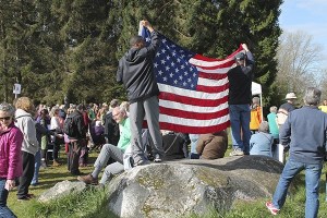 Voters show their patriotic spirit at Saturday’s caucus.