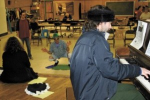 Band director Chris Overstreet practices a piece.