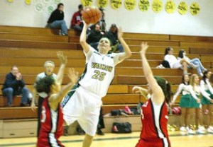 Kelly Costello puts up 2 of her game-high 16 points as the Pirate girls pound Orting 48-22.
