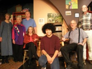 The cast takes a break on the set. They are