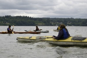 Activists practiced kayaking maneuvers Tuesday as part of the Localize This! Action Camp.