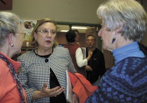 Jan Drago talks to Islanders Carla Okigwe and May Gerstle Monday night.
