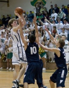 John Gage scored the game high of 18 points against Cascade Christian.