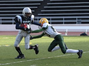 Michael Alberthal goes after the Spanaway quarterback.
