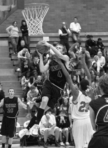 Thomas Timm-Skove glides to the basket past Seattle Academy defenders on Saturday.