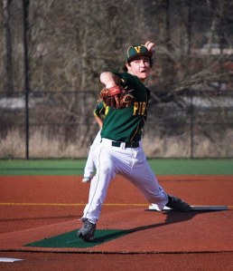 Junior Logan Hawkins pitches against Cedar Park Christian and picks up the 11-5 win.