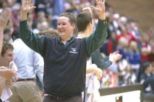 Vashon High School boys basketball coach Andy Sears celebrates as the final buzzer sounds on Vashon's 55-46 victory over the Kings.