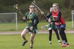 Junior Sarah Raymond heads toward the goal in last week's game against Kennedy High School.