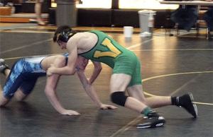 Vashon’s Chester Pruett takes on his Sultan opponent at the regional wrestling tournament last weekend in Bellingham. Pruett took third in his weight class at the tournament.