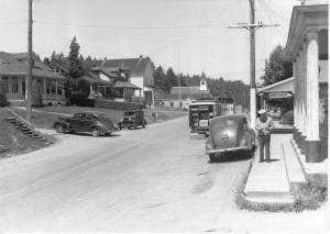A 1930s photo of Burton shows photographer Norman Edson in front of the post office.