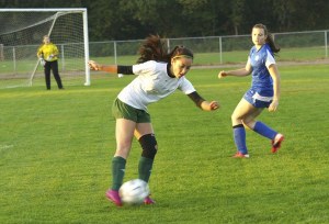 Pirate Mykah Shiosaki maneuvers away from a Life Christian defender early in the Vashon girls' 11-0 defeat of the Eagles.