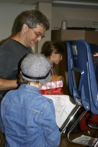 Andy James enjoys cards and gifts from his fourth-grade students on the last day of school.